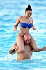 MELANIE BROWN in Bikini at a Beach in Turks & Caicos 02/08/2016