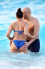 MELANIE BROWN in Bikini at a Beach in Turks & Caicos 02/08/2016