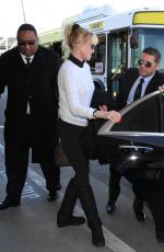 MELANIE GRIFFITH Arrives at Los Angeles International Airport 02/02/2016