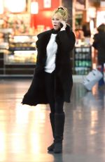 MELANIE GRIFFITH at JFK Airport in New York 02/02/2016