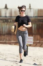 MIRANDA KERR Out Jogging at a Beach in Malibu 02/24/2016