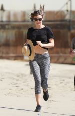 MIRANDA KERR Out Jogging at a Beach in Malibu 02/24/2016