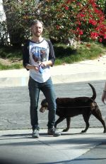 Pregnant ANNE HATHAWAY Walks Her Dog Out in Los Angeles 02/14/2016