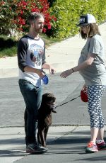 Pregnant ANNE HATHAWAY Walks Her Dog Out in Los Angeles 02/14/2016