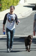 Pregnant ANNE HATHAWAY Walks Her Dog Out in Los Angeles 02/14/2016