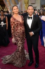 Pregnant CHRISSY TEIGEN at 88th Annual Academy Awards in Hollywood 02/28/2016