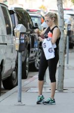 REESE WITHERSPOON Paying for Her Parking in Los Angeles 02/20/2016