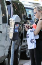 REESE WITHERSPOON Paying for Her Parking in Los Angeles 02/20/2016