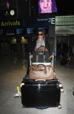 ALESSANDRA AMBROSIO at Charles-De-Gaulle Airport in Paris 03/02/2016