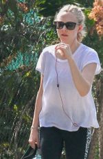 AMANDA SEYFRIED Walks Her Dog Out in Los Angeles 03/19/2016