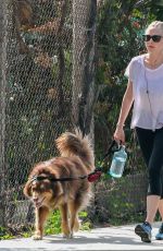 AMANDA SEYFRIED Walks Her Dog Out in Los Angeles 03/19/2016