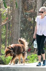 AMANDA SEYFRIED Walks Her Dog Out in Los Angeles 03/19/2016
