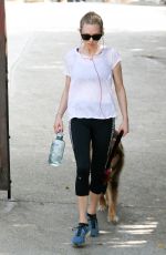 AMANDA SEYFRIED Walks Her Dog Out in Los Angeles 03/19/2016