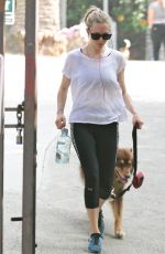 AMANDA SEYFRIED Walks Her Dog Out in Los Angeles 03/19/2016