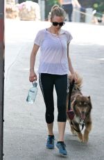 AMANDA SEYFRIED Walks Her Dog Out in Los Angeles 03/19/2016