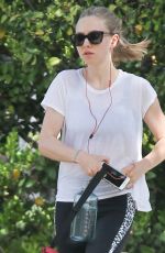 AMANDA SEYFRIED Walks Her Dog Out in Los Angeles 03/19/2016