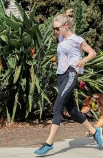 AMANDA SEYFRIED Walks Her Dog Out in Los Angeles 03/19/2016