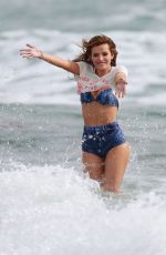 BELLA THORNE in Bikini on the Set of a Photoshoot at a Beach in Malibu 03/03/2016