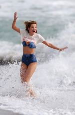 BELLA THORNE in Bikini on the Set of a Photoshoot at a Beach in Malibu 03/03/2016