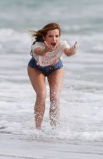 BELLA THORNE in Bikini on the Set of a Photoshoot at a Beach in Malibu 03/03/2016