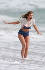 BELLA THORNE in Bikini on the Set of a Photoshoot at a Beach in Malibu 03/03/2016