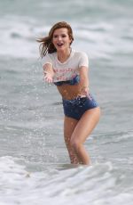 BELLA THORNE in Bikini on the Set of a Photoshoot at a Beach in Malibu 03/03/2016