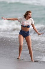 BELLA THORNE in Bikini on the Set of a Photoshoot at a Beach in Malibu 03/03/2016