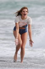 BELLA THORNE in Bikini on the Set of a Photoshoot at a Beach in Malibu 03/03/2016