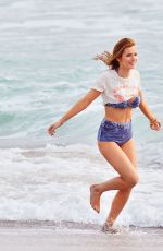 BELLA THORNE in Bikini on the Set of a Photoshoot at a Beach in Malibu 03/03/2016