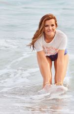 BELLA THORNE in Bikini on the Set of a Photoshoot at a Beach in Malibu 03/03/2016