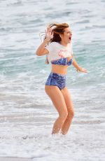 BELLA THORNE in Bikini on the Set of a Photoshoot at a Beach in Malibu 03/03/2016