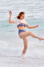 BELLA THORNE in Bikini on the Set of a Photoshoot at a Beach in Malibu 03/03/2016