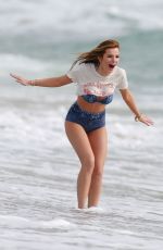 BELLA THORNE in Bikini on the Set of a Photoshoot at a Beach in Malibu 03/03/2016