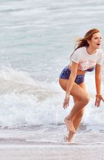 BELLA THORNE in Bikini on the Set of a Photoshoot at a Beach in Malibu 03/03/2016