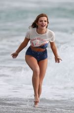 BELLA THORNE in Bikini on the Set of a Photoshoot at a Beach in Malibu 03/03/2016