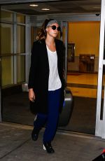 CARA DELEVINGNE at JFK Airport in New York 03/23/2016