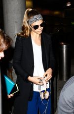 CARA DELEVINGNE at JFK Airport in New York 03/23/2016