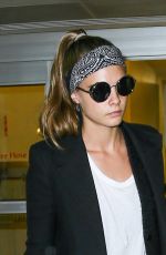 CARA DELEVINGNE at JFK Airport in New York 03/23/2016