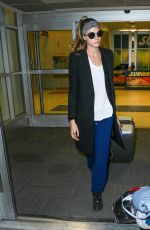 CARA DELEVINGNE at JFK Airport in New York 03/23/2016