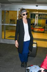 CARA DELEVINGNE at JFK Airport in New York 03/23/2016