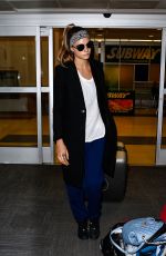 CARA DELEVINGNE at JFK Airport in New York 03/23/2016