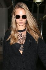 CARA DELEVINGNE at Los Angeles International Airport 03/25/2016