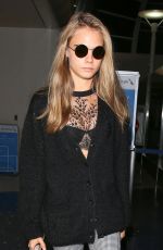 CARA DELEVINGNE at Los Angeles International Airport 03/25/2016