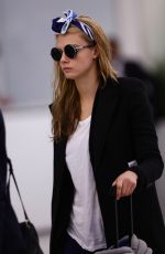 CARA DELEVINGNE at Orly Airport in Paris 03/23/2016