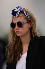 CARA DELEVINGNE at Orly Airport in Paris 03/23/2016