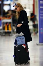 CARA DELEVINGNE at Orly Airport in Paris 03/23/2016