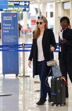 CARA DELEVINGNE at Orly Airport in Paris 03/23/2016