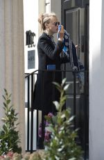 CARA DELVONGNE Out and About in London 03/22/2016