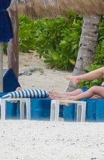 CATHERINE ZETA JONES in Swimsuit on the Beach in Cancun 03/23/2016