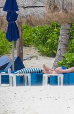 CATHERINE ZETA JONES in Swimsuit on the Beach in Cancun 03/23/2016